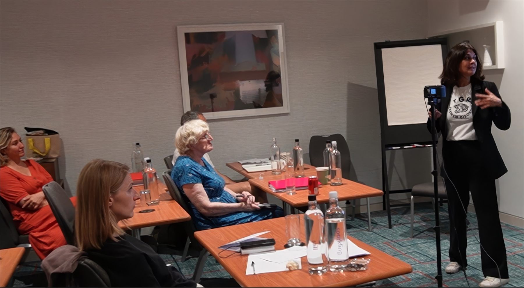 LCCHI lecturer speaking at an Open Day while the session is filmed